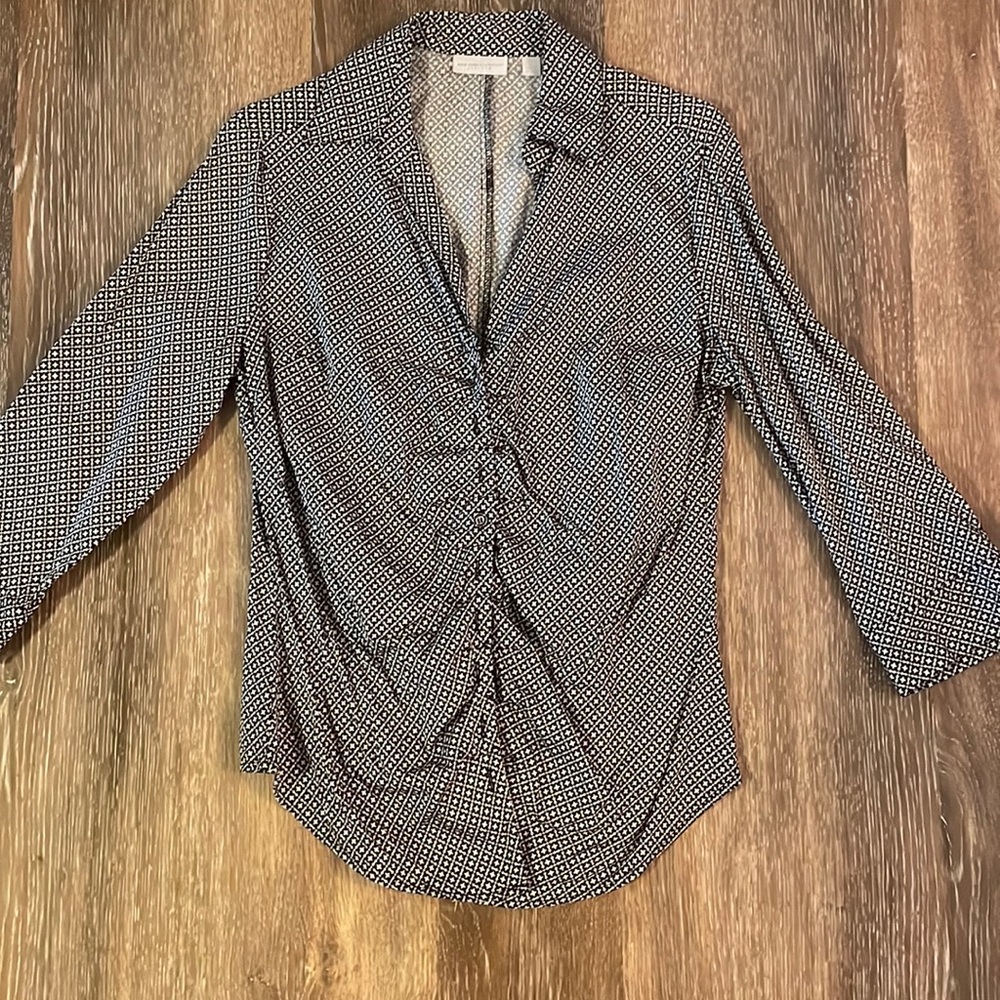 Collared blouse.
